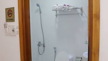 Shower, free toiletries, hair dryer, slippers