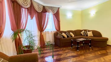 Apartment | Living room | 39-inch LED TV with cable channels, TV, DVD player