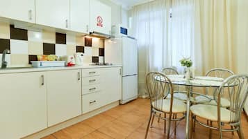 Apartment | Private kitchen | Full-size fridge, microwave, stovetop, electric kettle
