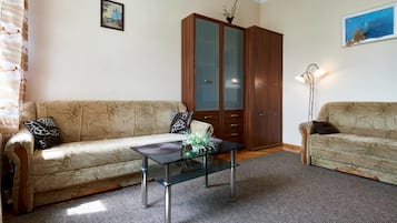 Apartamento | Sala de estar | Una televisión