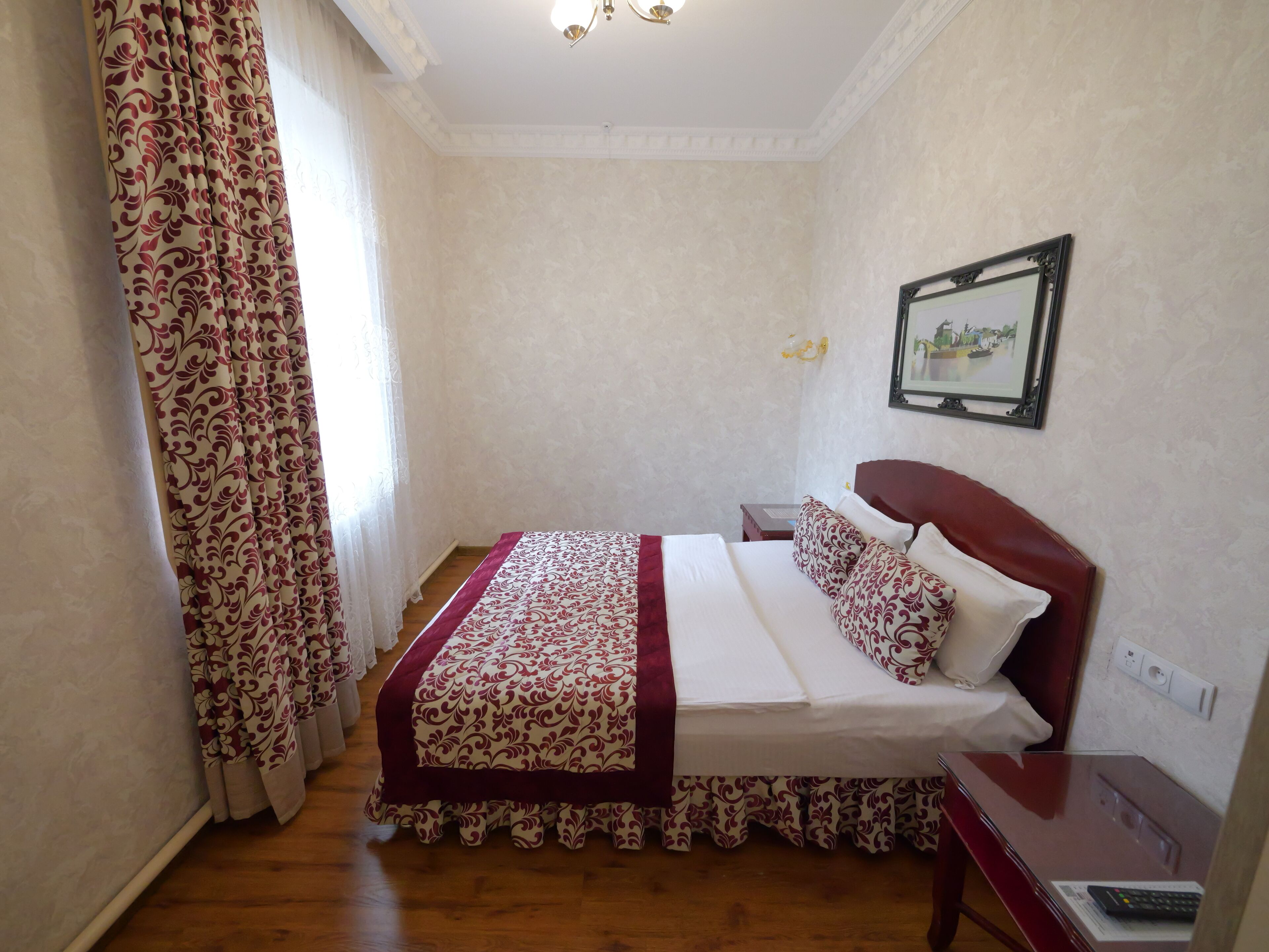 Standard Quadruple Room | In-room safe, desk, laptop workspace, free WiFi