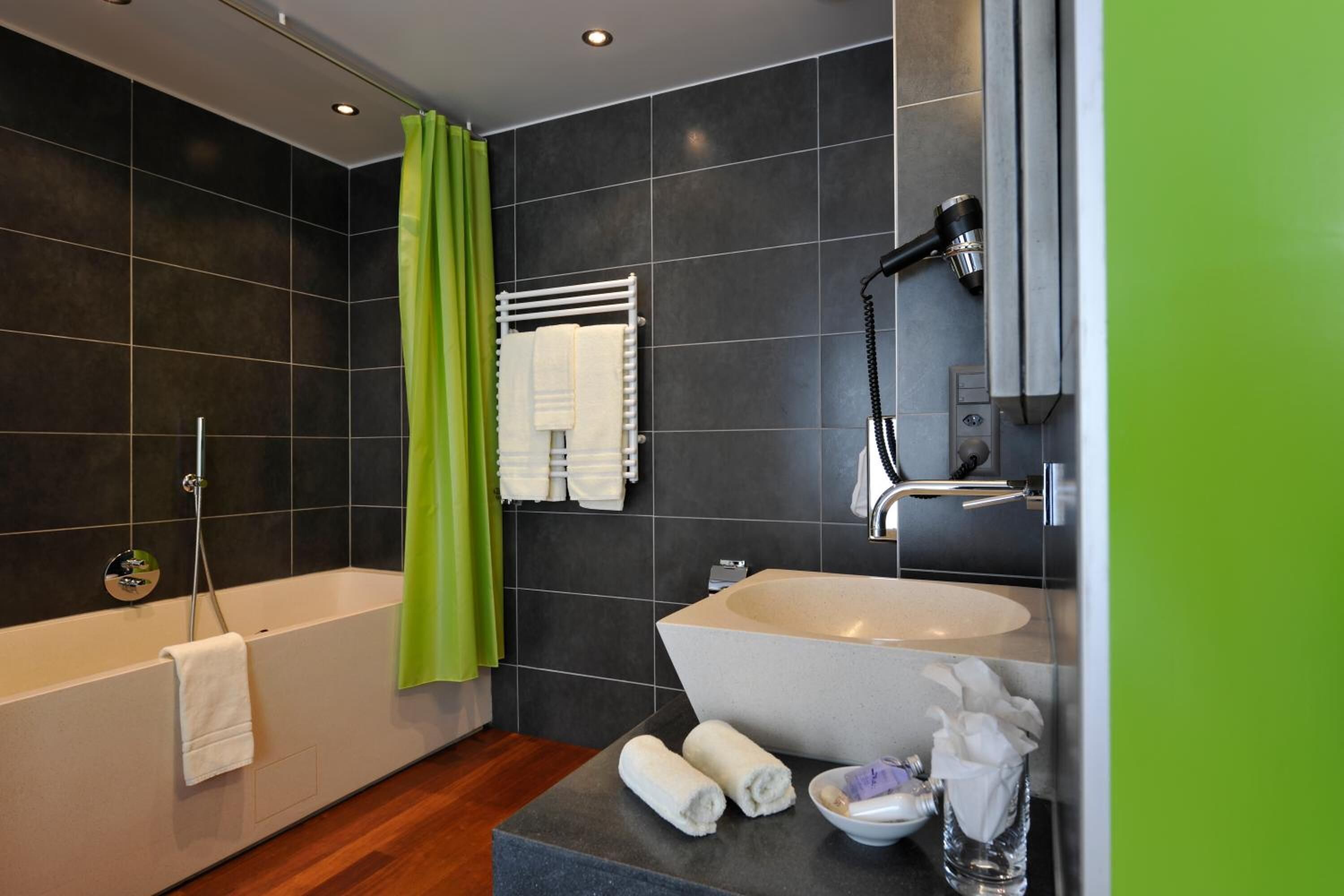 free toiletries, hair dryer, slippers, towels