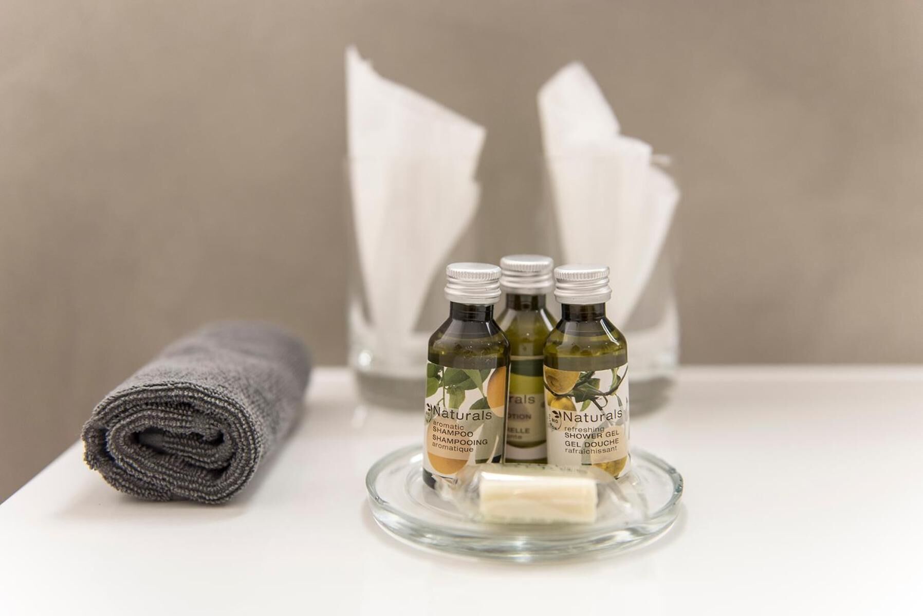 free toiletries, hair dryer, slippers, towels