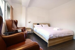 Camera Deluxe, 1 letto king, bagno privato | Tende oscuranti, Wi-Fi gratuito, lenzuola