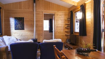 Cottage, 2 Bedrooms (Aifnerblick) | Living area | Flat-screen TV