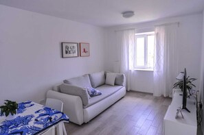 Apartamento, 2 habitaciones | Zona de estar