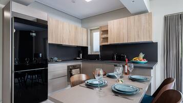 Apartment, 2 Bedrooms (Elegant) | Private kitchen | Full-size fridge, oven, stovetop, dishwasher
