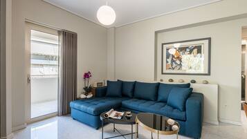 Apartment, 2 Bedrooms (Elegant) | Living area | 40-inch flat-screen TV with cable channels, Smart TV