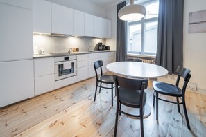 Studio, City View | Private kitchen - HVC Apartments Köydenpunojankatu 7 (Helsinki)