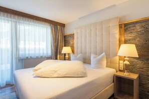 Habitación doble | Caja de seguridad en la habitación, wifi gratis y ropa de cama 