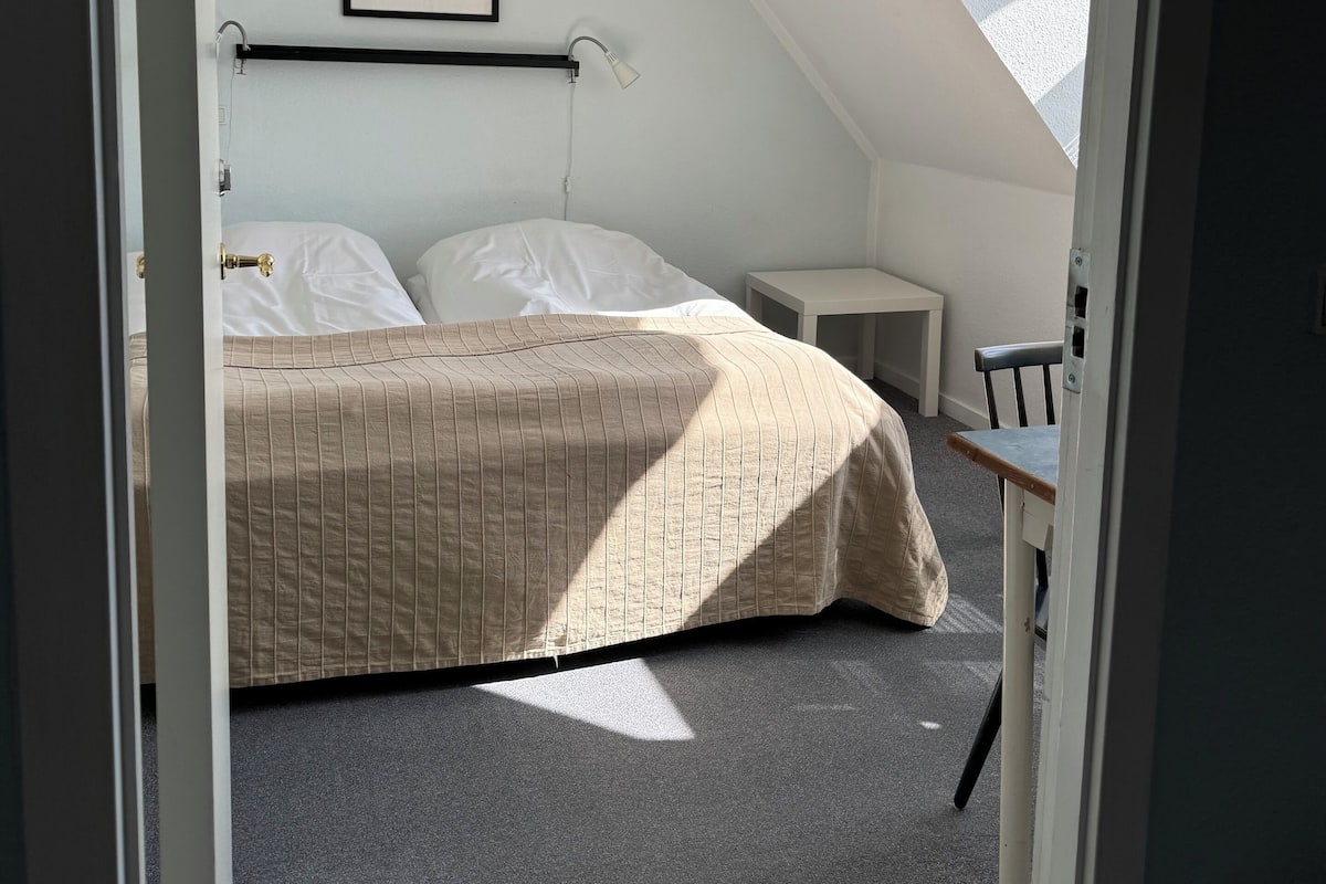 Basic Double Room, Shared Bathroom | Down comforters, individually decorated, individually furnished, desk
