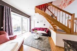 Appartement, rez-de-chaussée | Aire de séjour | Téléviseur à écran plat