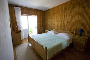 Apartment, 2 Bedrooms, Balcony, Sea View | 2 bedrooms, desk, soundproofing, iron/ironing board