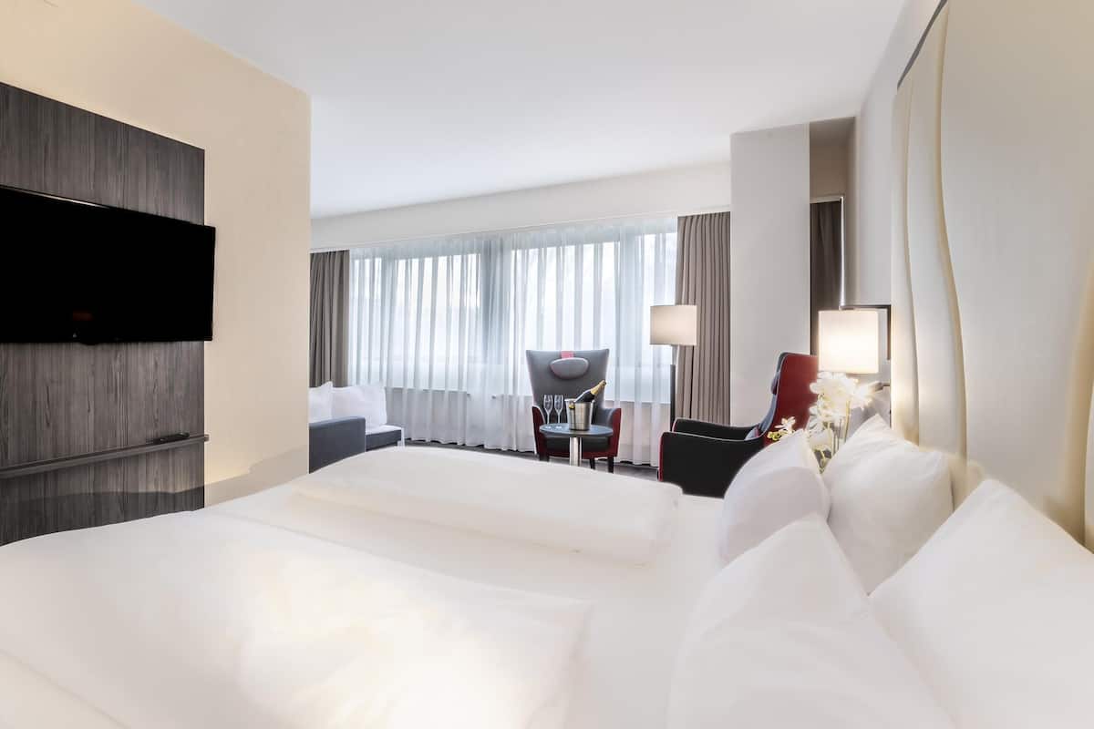 Junior Suite, Multiple Beds (Living Room;with Sofabed) | Laptop workspace, soundproofing, free cots/infant beds, free WiFi