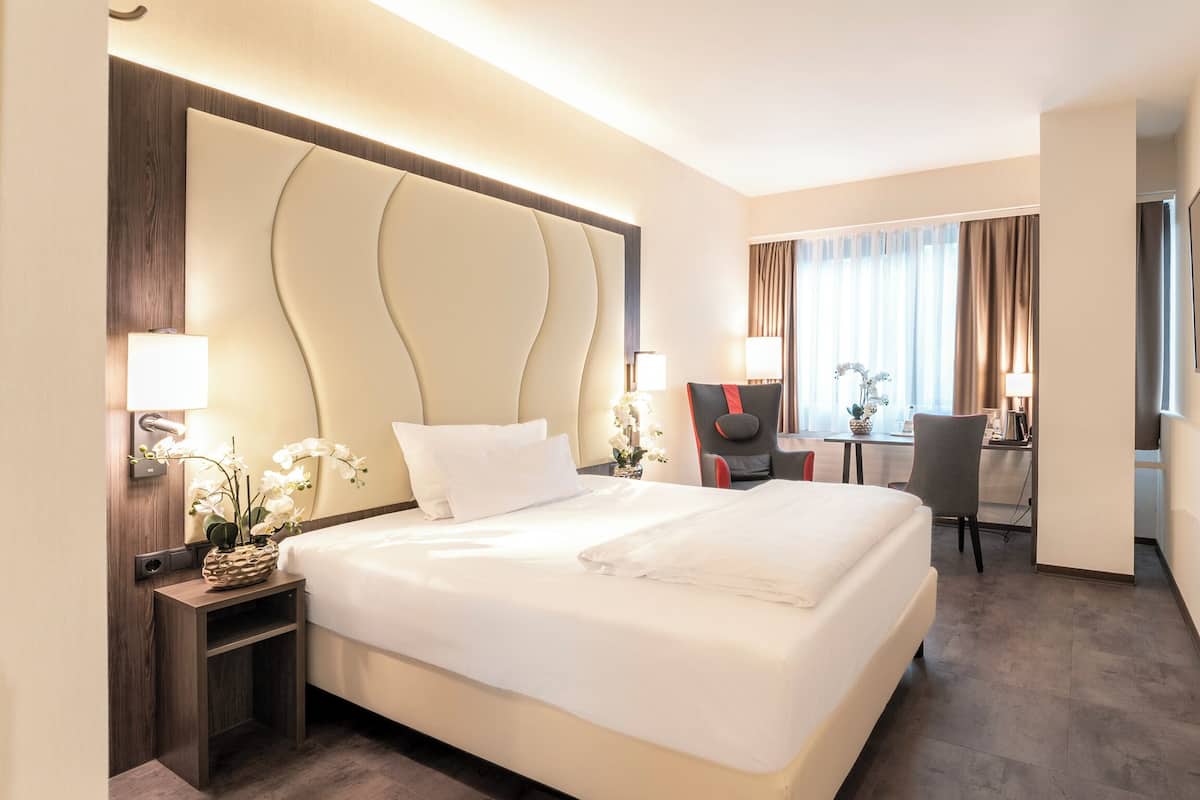 In-room safe, desk, laptop workspace, blackout curtains