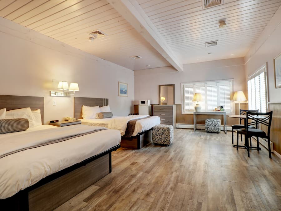 Room, 2 Queen Beds | Iron/ironing board, free WiFi, bed sheets