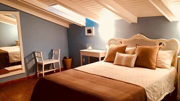 Family Room, 1 Bedroom (Four Guests) | 1 bedroom, down duvets, memory-foam beds, individually decorated