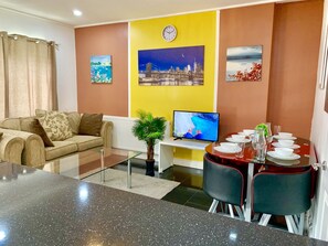 Appartement Deluxe, 3 chambres | Coin séjour