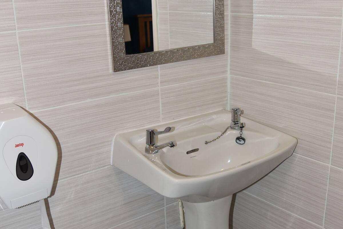 family room | desk, iron/ironing board, free wifi, bed sheets