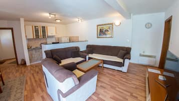 Apartment, 2 Bedrooms | Living area | Flat-screen TV