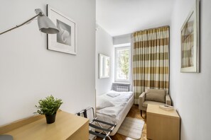 Habitación junior | Tabla de planchar con plancha y wifi gratis