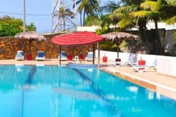 Indoor pool, open 6:00 AM to 7:00 PM, pool umbrellas, sun loungers