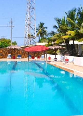 Indoor pool, open 6:00 AM to 7:00 PM, pool umbrellas, sun loungers