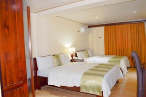 Deluxe Room | In-room safe, desk, laptop workspace, blackout curtains - The Cape Hotel (Monrovia)