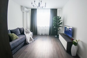 Apartamento família, 1 quarto | 1 quarto, ferros/tábuas de passar roupa, Wi-Fi de cortesia