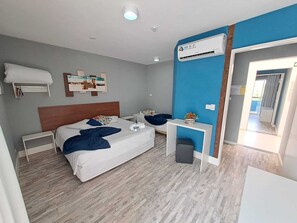 Hypo-allergenic bedding, pillowtop beds, desk, laptop workspace