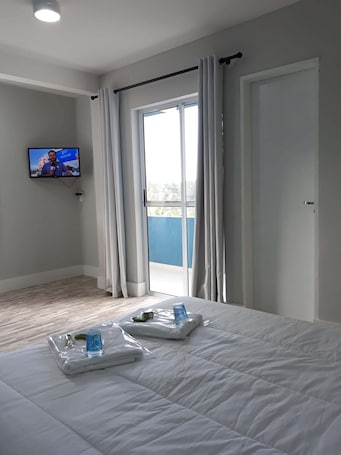 Hypo-allergenic bedding, pillow-top beds, desk, laptop workspace