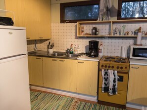 Fridge, microwave, cookware/dishes/utensils
