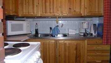 Fridge, microwave, cookware/dishes/utensils