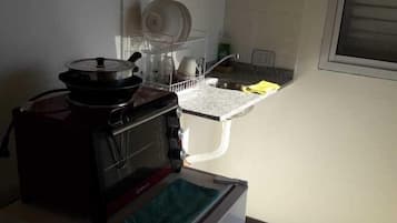 Fridge, stovetop, cookware/dishes/utensils