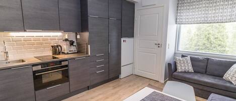 Fridge, microwave, cookware/dishes/utensils