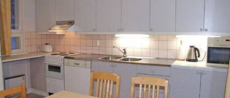 Fridge, microwave, cookware/dishes/utensils