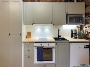 Fridge, microwave, cookware/dishes/utensils