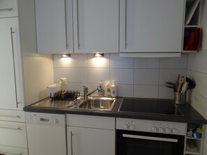 Fridge, dishwasher, cookware/dishes/utensils, dining tables - Neuschwändi 66 by Interhome (Engelberg)