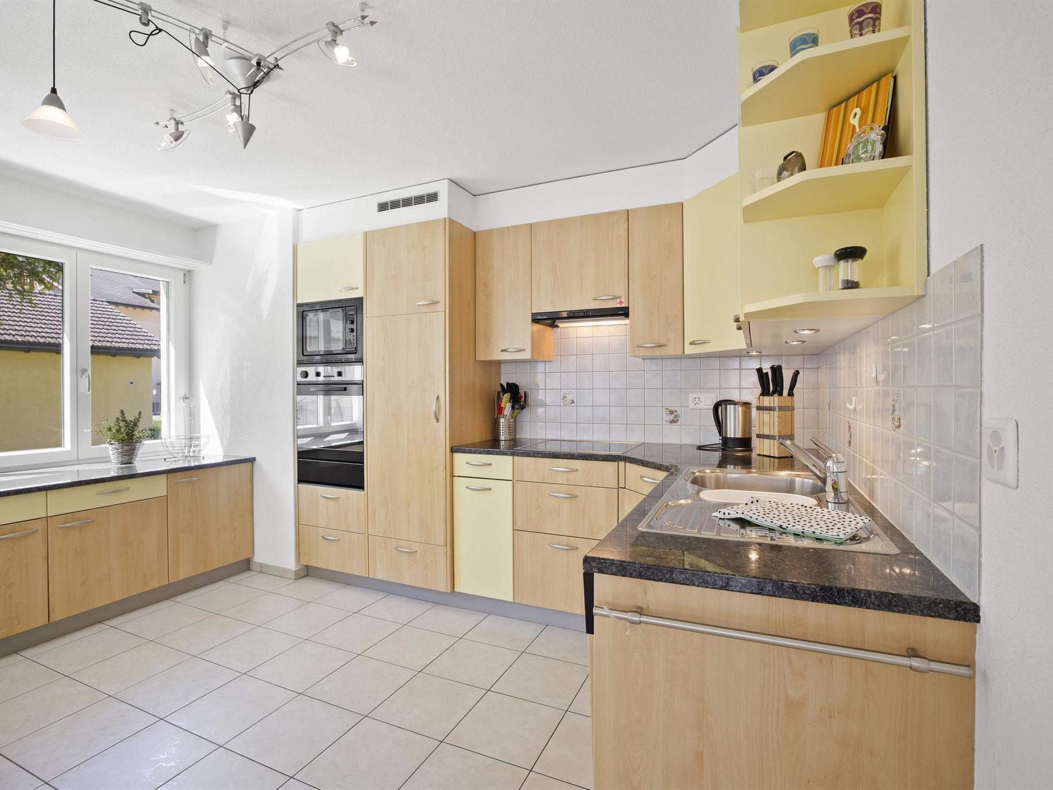 Fridge, dishwasher, highchair, cookware/dishes/utensils