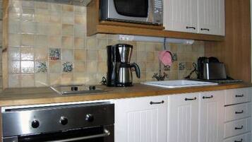 Fridge, microwave, cookware/dishes/utensils
