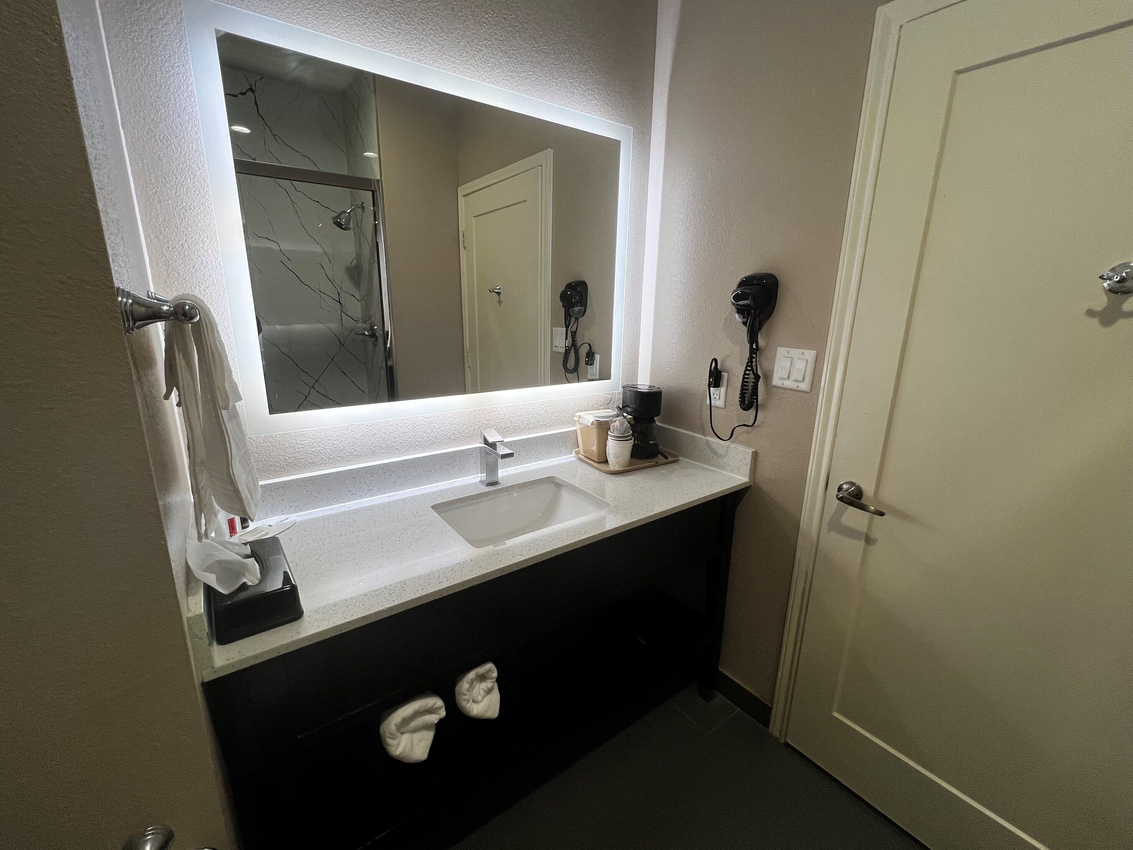 combined shower/bathtub, free toiletries, hair dryer, towels