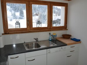 Fridge, dishwasher, cookware/dishes/utensils, dining tables