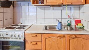 Fridge, microwave, cookware/dishes/utensils