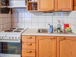 Fridge, microwave, cookware/dishes/utensils