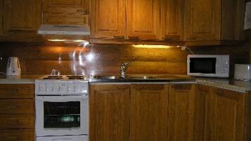 Fridge, microwave, cookware/dishes/utensils