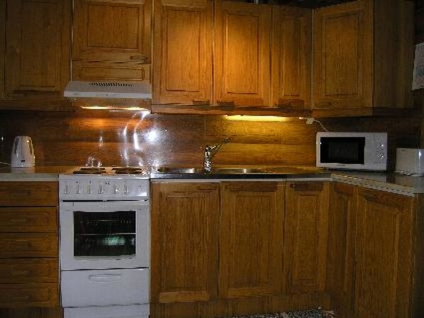 Fridge, microwave, cookware/dishes/utensils