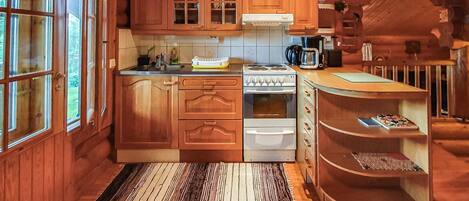 Fridge, microwave, cookware/dishes/utensils