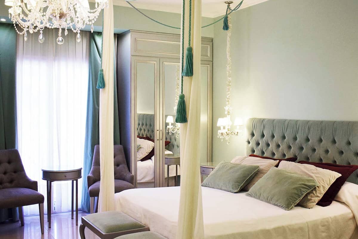 Habitación triple Deluxe | 1 dormitorio y ropa de cama hipoalergénica