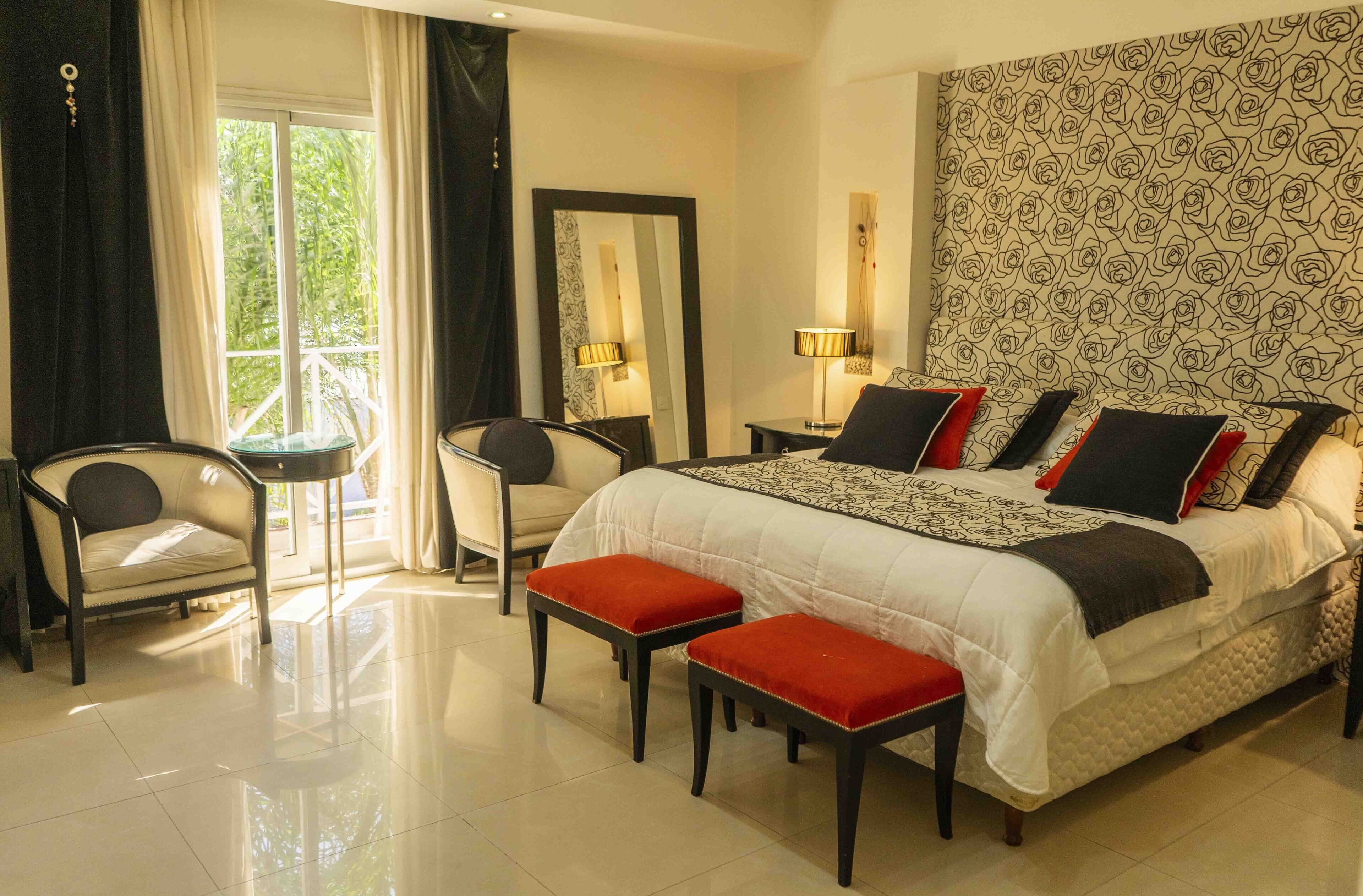 Deluxe Quadruple Room | Hypo-allergenic bedding, pillow-top beds, in-room safe