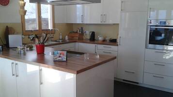 Fridge, dishwasher, cookware/dishes/utensils